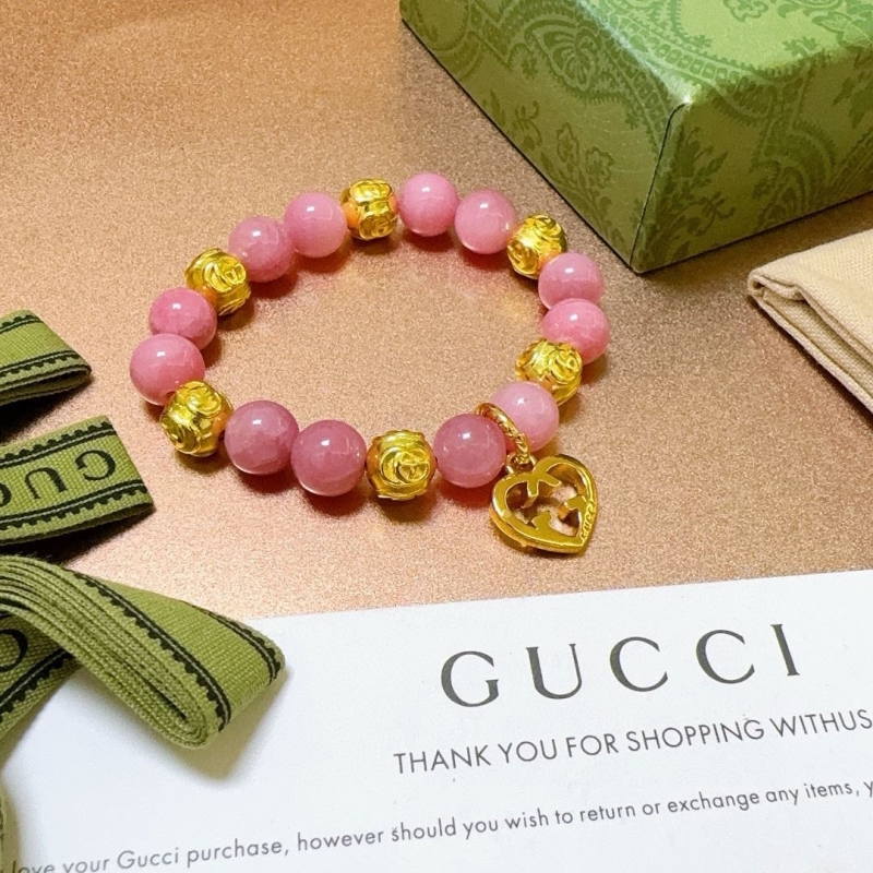 G*u*i bracelets